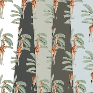May include: A collection of wallpaper samples featuring a repeating pattern of giraffes and banana leaves. The giraffes have brown and tan spots, and the leaves are green. The background colors vary from white to gray and blue.