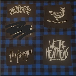 May include: Four black fabric patches with white text and graphics. The patches are on a blue and black checkered background. The patches read "Harley Poe", "Pat the Bunny", "the taxpayers", and "We the Heathens".