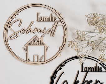 Door wreath as a gift for a wedding, housewarming, house purchase personalized with family name made of wood as a great home decoration for the entrance area