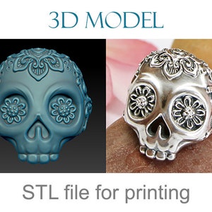 May include: 3D model of a silver skull ring with floral details. The ring is shown in two views: a 3D render and a photo of the actual ring. STL file for printing.
