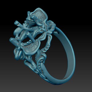 May include: A blue 3D printed ring with an intricate, organic design. The ring is made of a single piece of material and has a smooth, polished finish.