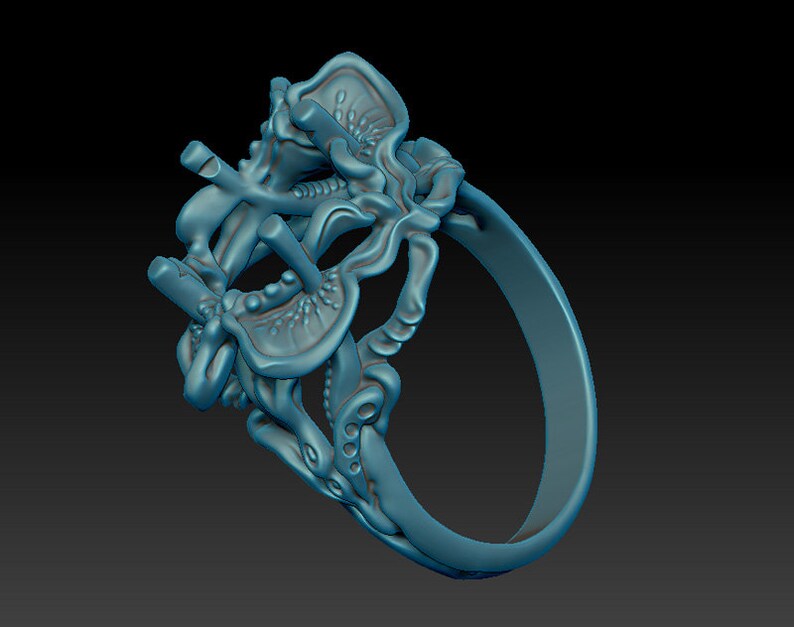 May include: A blue 3D printed ring with an intricate, organic design. The ring is made of a single piece of material and has a smooth, polished finish.