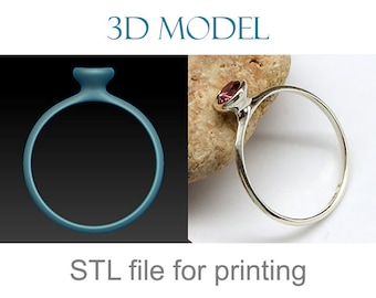 May include: 3D model of a silver ring with a red gemstone. STL file for printing.