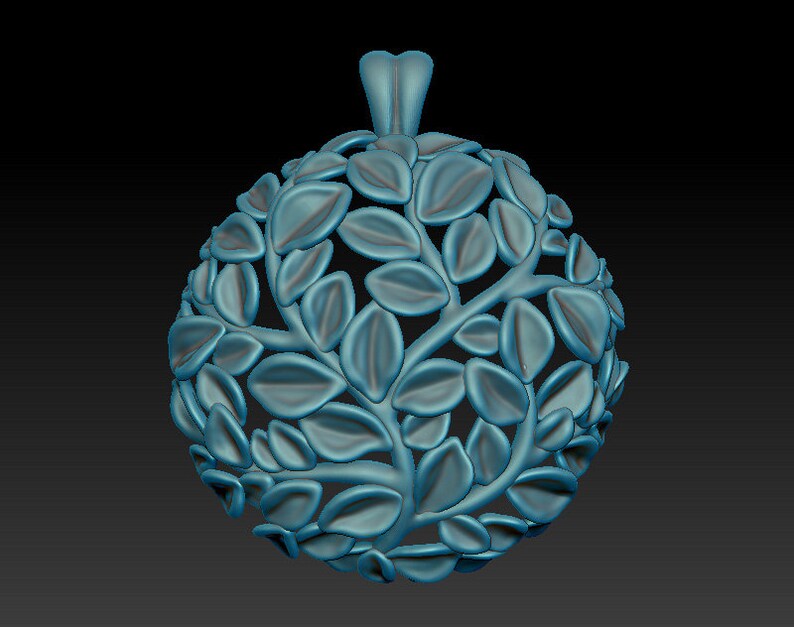 May include: A teal blue pendant in the shape of a sphere with a delicate, intricate design of leaves and branches. The pendant has a loop at the top for attaching a chain.