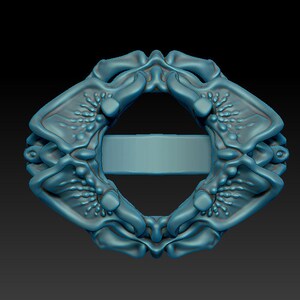 May include: A blue, intricately designed ring with a smooth, circular band. The ring is made of a textured metal and has a unique, organic shape.