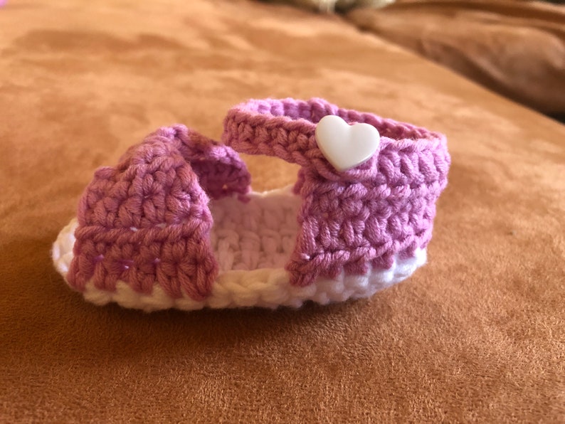 Super cute baby sandals in different designs. In orange, crocheted with flower or in pink with heart button made of cool soft cotton. image 5