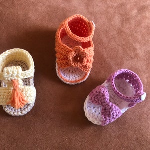 Super cute baby sandals in different designs. In orange, crocheted with flower or in pink with heart button made of cool soft cotton. image 7