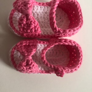 Super cute baby sandals in different designs. In orange, crocheted with flower or in pink with heart button made of cool soft cotton. image 8