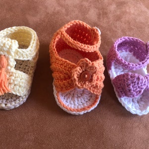 Super cute baby sandals in different designs. In orange, crocheted with flower or in pink with heart button made of cool soft cotton. image 6