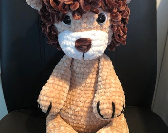 Cute lion, cuddly animal crocheted from velvety chenille wool with safety eyes
