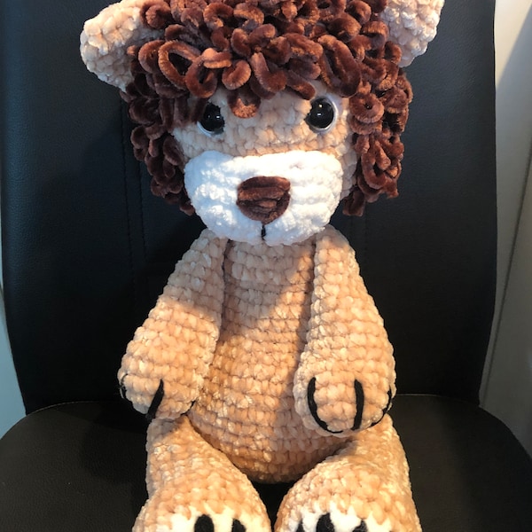 Cute lion, cuddly animal crocheted from velvety chenille wool with safety eyes