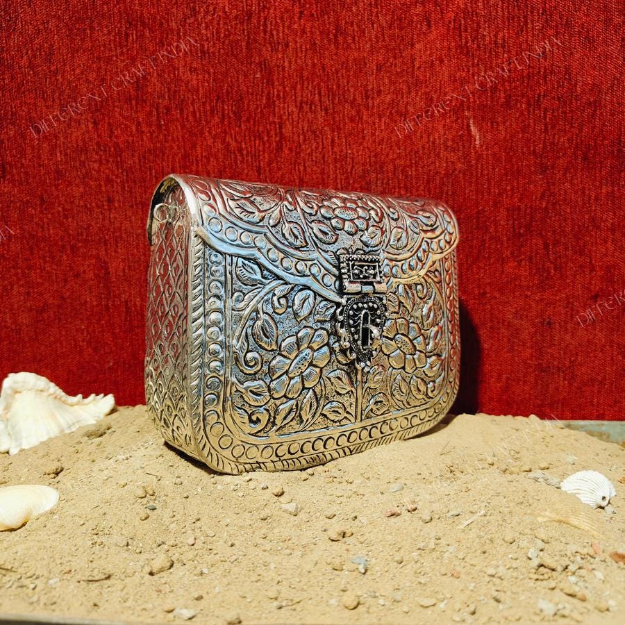 Silver metal purse deals