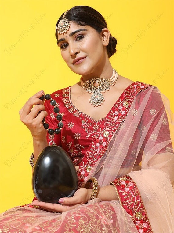 Egg shaped mini clutch pearl beaded handle resin bag bracelet