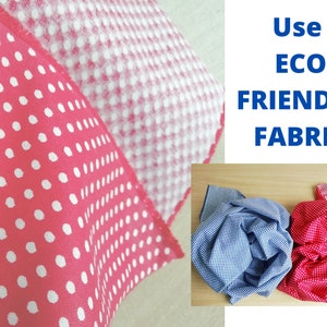 Three fabric swatches, one red with white polka dots, one blue with white gingham pattern, and one white with red polka dots. The text 'Use ECO FRIENDLY FABRIC' is in blue text on a white background.