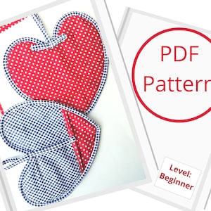 May include: PDF pattern for a beginner sewing project to make a pair of red and blue heart-shaped pot holders with white polka dots.