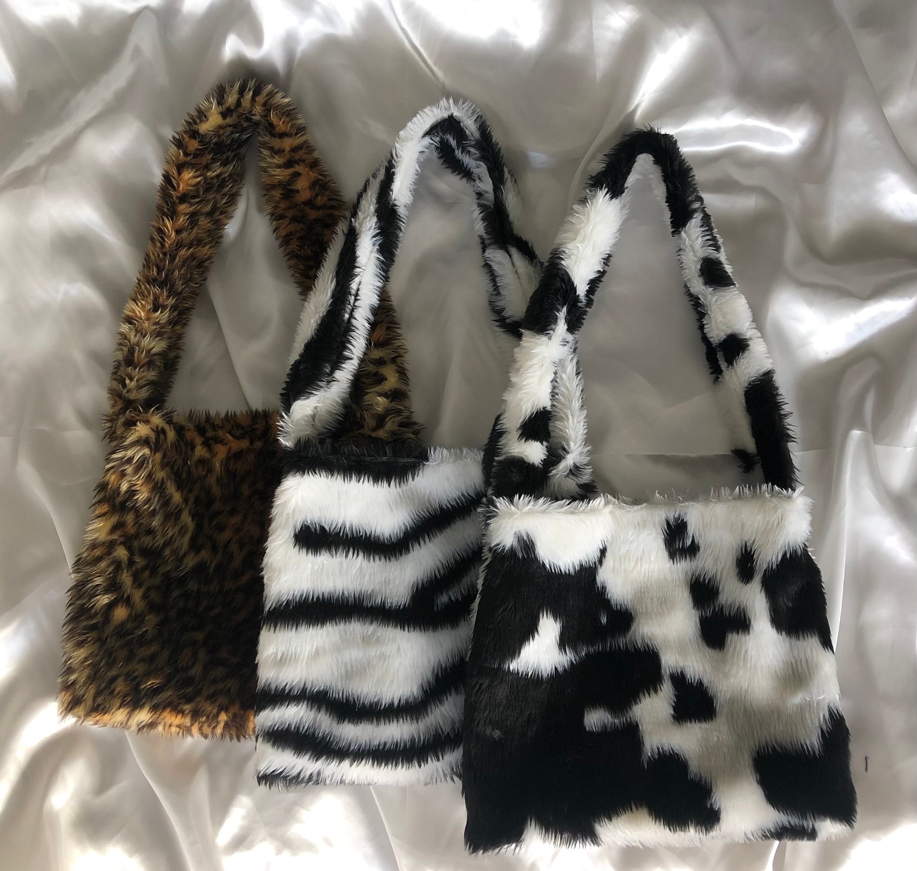 cow print fluffy slides