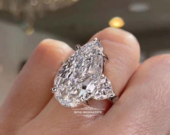 Anillo de compromiso de tres piedras de moissanita en forma de pera. Anillo de bodas de oro macizo de 10 quilates.