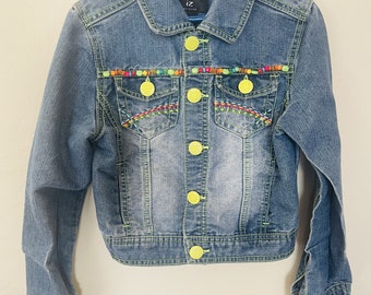 Colorful beaded denim jacket with lime green buttons