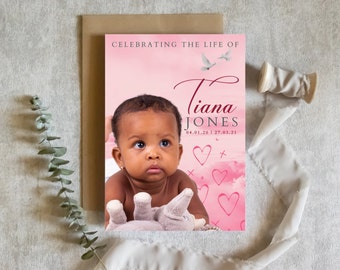 May include: A pink and white memorial card featuring a photograph of a baby girl. The card reads "Celebrating the life of Tiana Jones 04.01.20 | 27.03.21" and has a pink and white watercolour background with white doves and pink hearts.