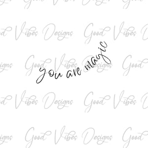 May include: Black and white typography design with the text "you are magic" on a white background. The text is in a cursive font and is angled diagonally.