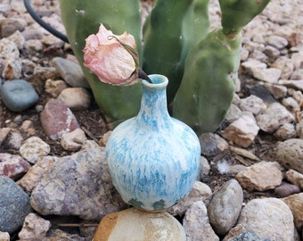 Tiny drippy blue and white ceramic bud vase