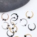 Crescent septum stretcher pincher | ear gauges tapers | tapered buffalo horn nose tusk | piercing | surgical steel nose ring 