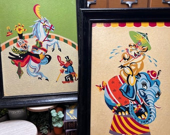 Vintage framed paint by numbers circus prints, clown and elephant.