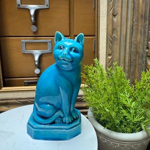 Vintage Chinese porcelain turquoise glazed cat figurine.
