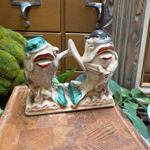 Vintage C. Miller anthropomorphic fish salt and pepper shakers.