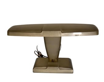 Lámpara de escritorio vintage de metal con forma de ala de vuelo, estilo industrial Art Déco.