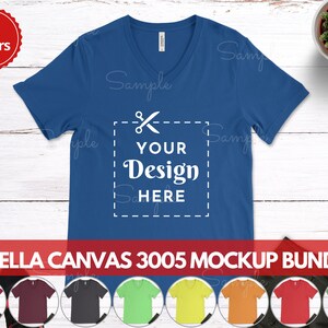 May include: A mockup bundle of 47 Bella Canvas 3005 V-neck t-shirts in various colors. The t-shirts are laid out on a white wooden surface. The text "YOUR DESIGN HERE" is displayed on a blue t-shirt.