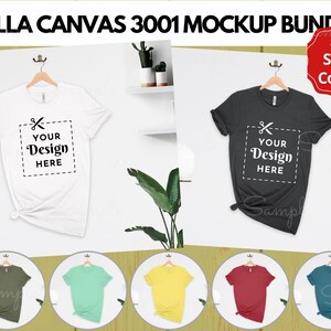 May include: Mockup of a Bella Canvas 3001 t-shirt in white and black, with the text "YOUR Design HERE" on each shirt. The image also shows six additional t-shirts in various colors, including green, mint, yellow, red, and teal.