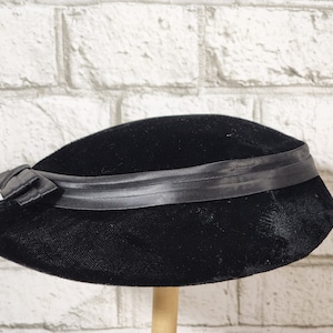Vintage black velvet tilt hat with black satin bow. Ladies funeral topper hat