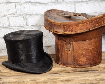 Antique leather hat box with original black beaver felt top hat. 19th century latter part / turn of the century 1900.