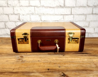 Antique tweed and leather suitcase, luggage, with a handle and gold latches including original silver key, circa 1930s.