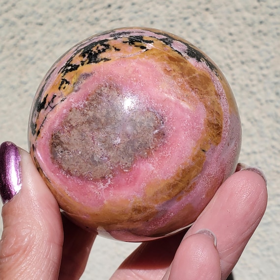 Pink Rhodonite Crystal Sphere from Pakistan  418 grams | 60mm