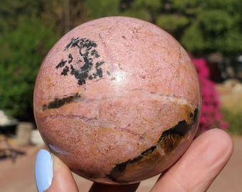 Pink Rhodonite Crystal Sphere from Pakistan  442 grams | 65mm