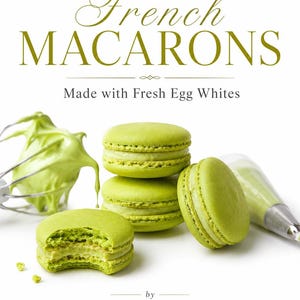 May include: Light green French macarons with a creamy filling, one with a bite taken out, next to a wire whisk coated in green batter and a piping bag. Text reads: French MACARONS Made with Fresh Egg Whites by MARINA SKUBCHENKO mariland_candies.