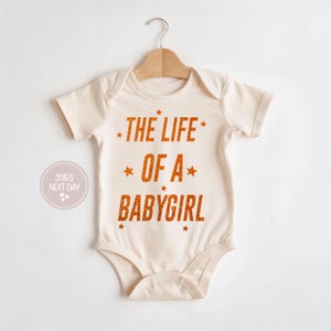 The Life Of a Babygirl Onesie®, Showgirl, Orange Glitter Baby Onesie®, Showgirl Baby Outfit