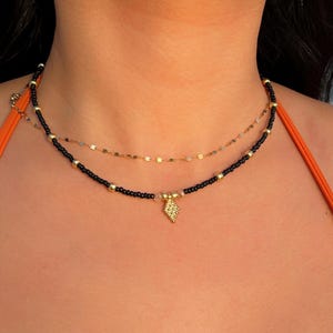 Beaded Charm Choker with Black Glass Seed Beads, Gold Plated Charm, Glass Crystal Beads, Gold Accent Beads, and 18K Plated Clasp  - “Dune”