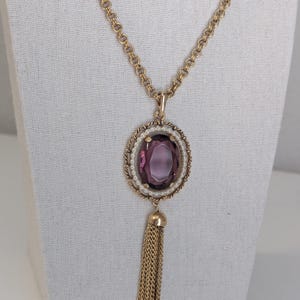 Vintage 1972 Avon Faux Amethyst Gemstone Gold tone Pendant Necklace with Tassels