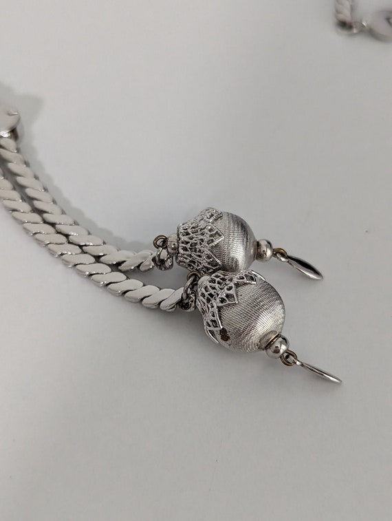 Monet Silvertone Tassel Pendant Necklace, Costume Jewelry For Sale at  1stDibs | silver tone tassel necklace, monet costume jewelry, monet tassel  necklace