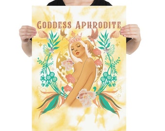 May include: A yellow and green poster with the text "Goddess Aphrodite" at the top. The poster features a woman with a crown on her head, surrounded by flowers, birds, and fish.