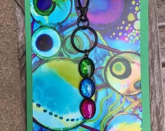 Keychain with three oval glass cabochons handpainted