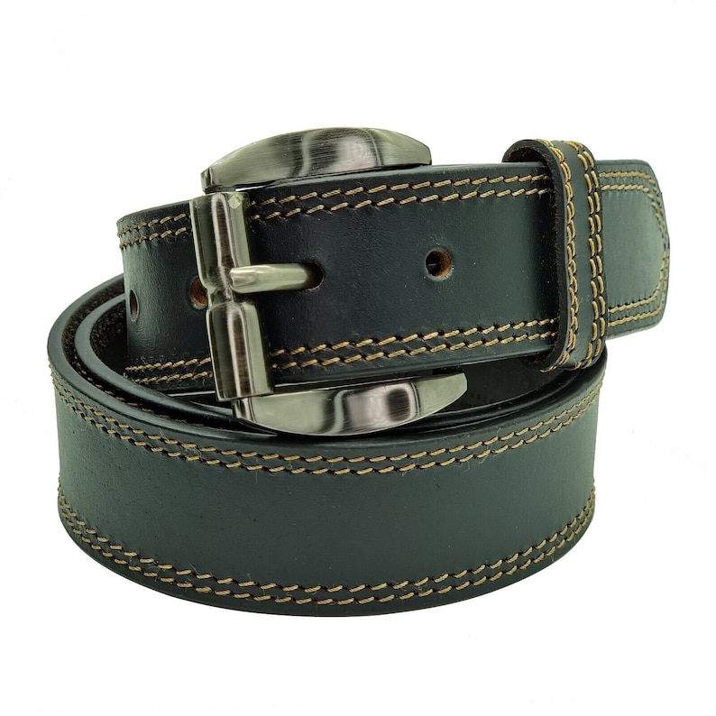 May include: A black leather belt with a silver buckle and brown stitching. The belt is rolled up and the buckle is visible.