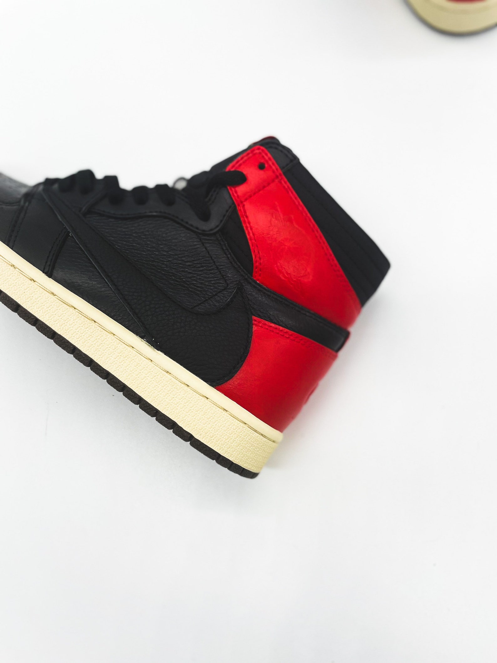 travis scott jordan 1 bred