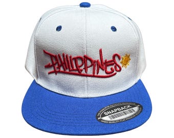 Philippines Graffiti  Snapback Hat – Street Style Embroidered Cap with Sun Emblem | Filipino Pride | White and Blue Flat Brim