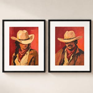 May include: Two framed art prints featuring oil-style paintings of individuals wearing cowboy hats, red bandanas, and brown jackets against a solid red background. Each portrait is encased in a simple black frame with a white mat border.