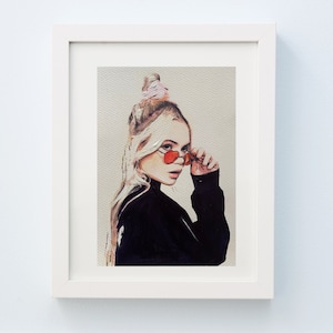 May include: A painting of a woman with blonde hair wearing a black turtleneck sweater and red heart-shaped sunglasses. She is looking to the side and has a pink hair tie in her hair.