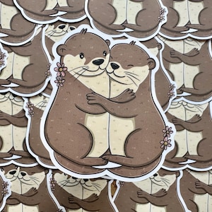 Adesivo fustellato Otter Cuddles / Carino / Lontra / Libri / Amore / Libresco / Lettura